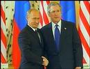 i_cnn_net_cnn_2002_WORLD_europe_08_01_russia.iran_story.bush.putin.shake.jpg