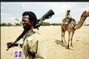eur_news1_yimg_com_eur.yimg.com_xp_afpji_20060511_060511182518.hs5sgr3z0_chadian-camel-guards-patrol-on-the-sudan-chad-bordb.jpg