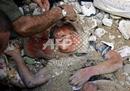 _nowarlb_com_images_Lebanese_civilians_dig_out_the_body_of_Zein_al-Abdinne_Zein_12_-_aug13-2.jpg