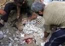 _nowarlb_com_images_Lebanese_civilians_dig_out_the_body_of_Zein_al-Abdinne_Zein_12_aug13-1.jpg