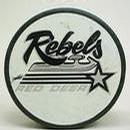 _gasolinealleyantiques_com_sports_images_hockeypuck_rebels-official1.JPG